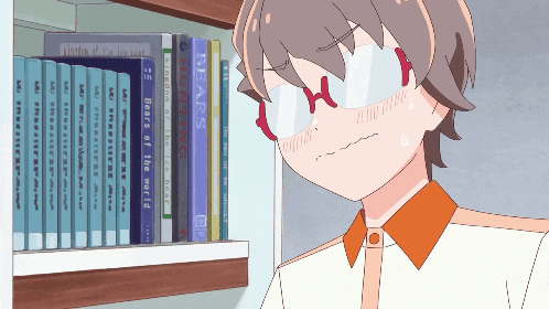 a girl wearing glasses stands in front of a shelf full of books including one titled ' boards of the world '