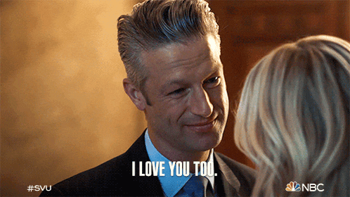 a man in a suit says " i love you too " to a woman