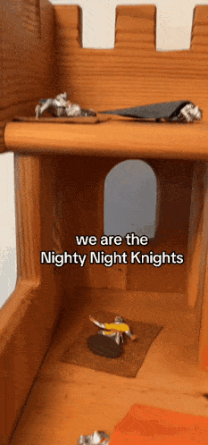 a wooden castle with the words " we are the nighty night knights "