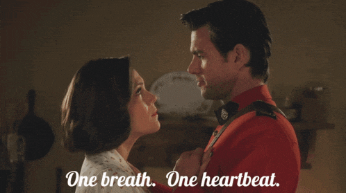 a man and woman are looking at each other with the words one breath one heartbeat behind them