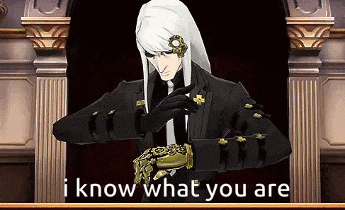 a man in a suit and gloves is standing in front of a door and says `` i know what you are '' .