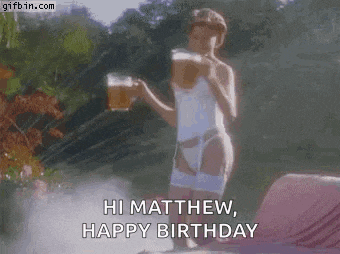 a woman in lingerie is holding a glass of beer and saying hi matthew , happy birthday .
