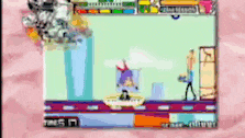 a computer screen shows a video game with a man holding a gun