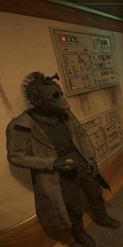 a man in a rat costume stands in front of a wall with buttons that say ' eee ' on it