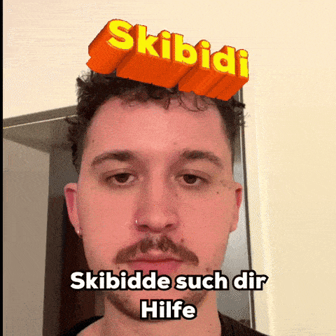 a man with a beard has the word skibidi on top of his head