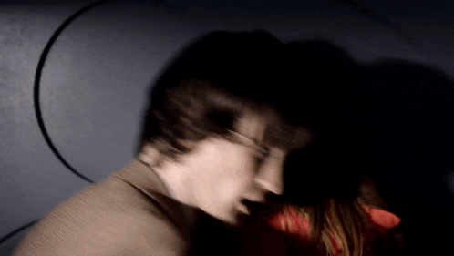 a blurry picture of a person 's face with a circle around it