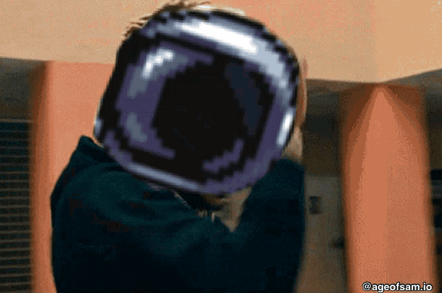 a pixel art of a person holding a purple object in front of their head