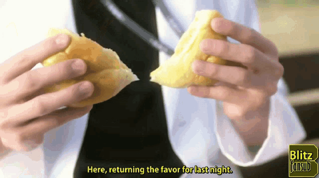 a person holding a piece of food with the words here returning the favor for last night below it