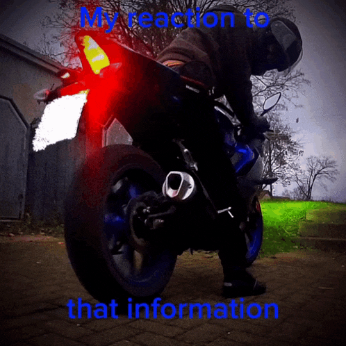 a man riding a motorcycle with the words my reaction to that information written below him