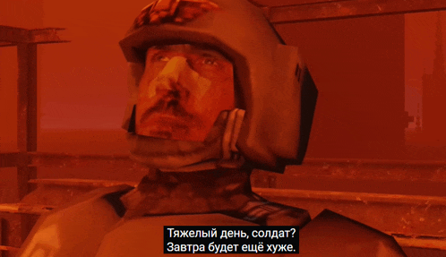 a man in a helmet says " тяжелый день солдат "