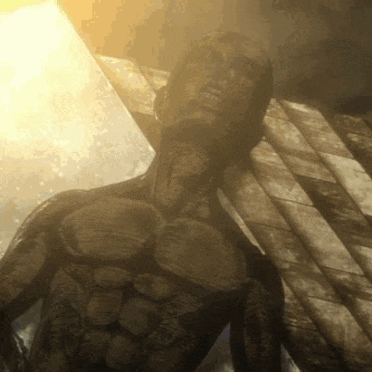 a close up of a statue of a man 's chest