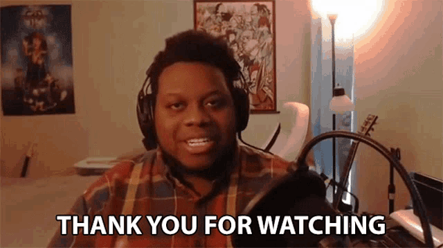 a man says thank you for watching in front of a microphone