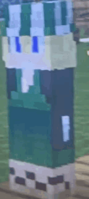 a close up of a minecraft character wearing a green and white striped hat and pants .