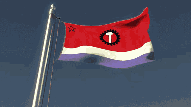 a red white and purple flag with a t on it