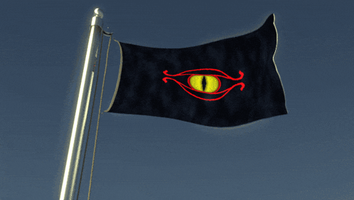 a black flag with a yellow eye and red swirls on it