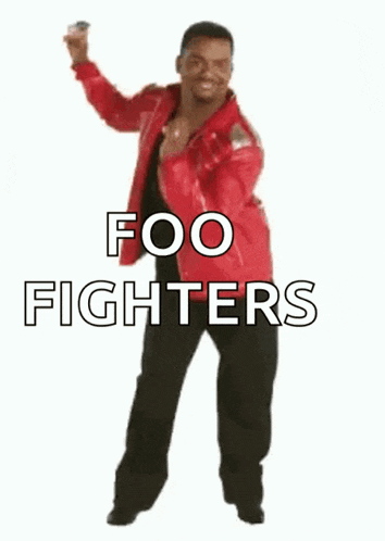 a man in a red jacket is dancing in front of a white background with the words happy fighters on it .