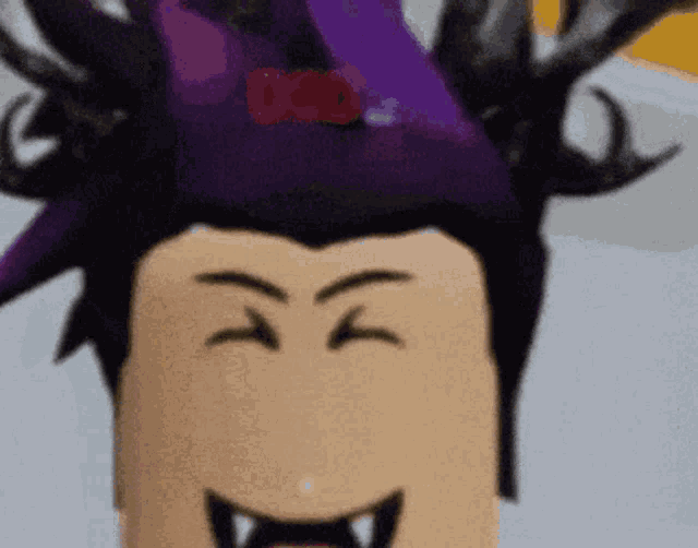 a close up of a person 's face with a purple hat on .