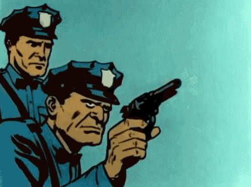 two police officers are standing next to each other one is pointing a gun