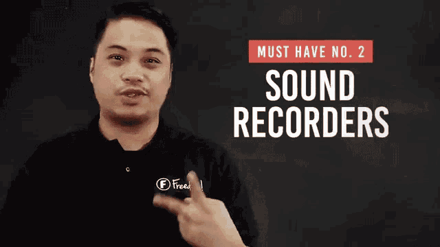 a man is pointing to his ear and the words must have no. 2 sound recorders are above him