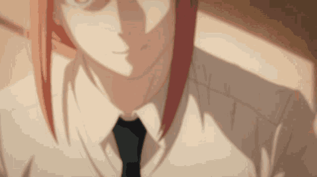 a close up of a person wearing a tie