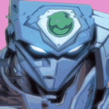 a close up of a robot 's face with a green smiley face on it