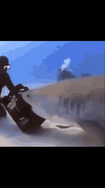 a man is riding a surfboard in the ocean