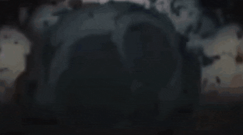 a close up of a person 's face with a scary mask on .