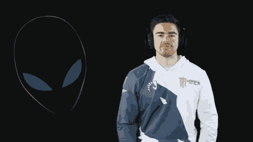 a man wearing headphones is wearing a monster energy sweatshirt