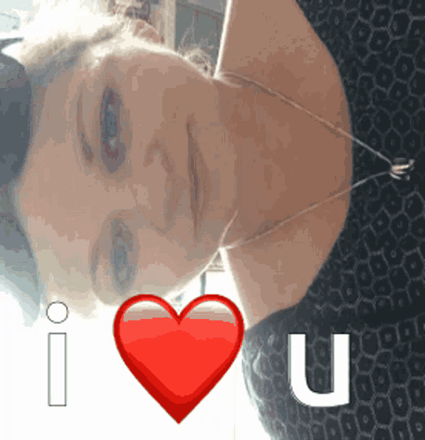 a woman with a red heart and the words i love you