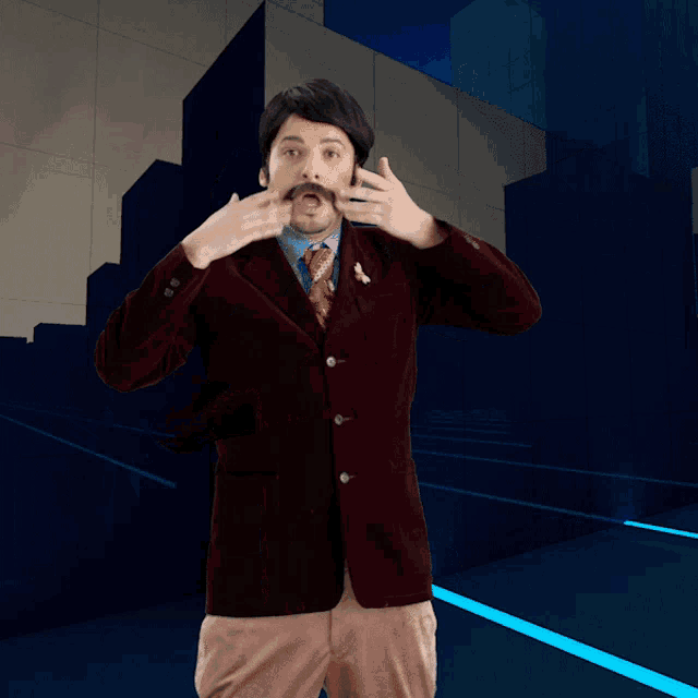 a man with a mustache wearing a suit and tie is making a funny face