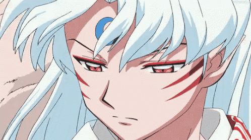 a close up of a cartoon character with white hair and red stripes on his eyes
