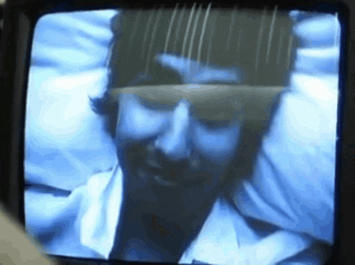 a close up of a person 's face on a screen