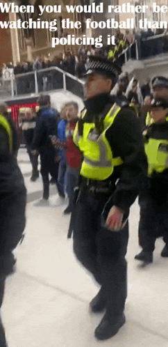 a group of police officers are standing in front of a crowd with the caption when you would rather