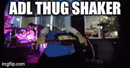 adl thug shaker is written above a person playing a violin