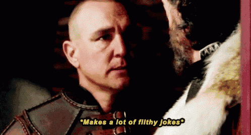 a man with a beard is talking to another man and says `` makes a lot of filthy jokes ''