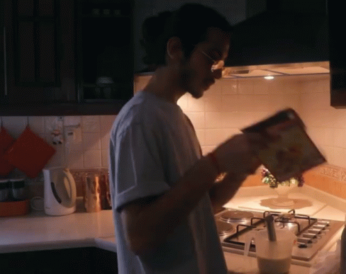 Flipping Reading GIF - Flipping Reading Cereals GIFs