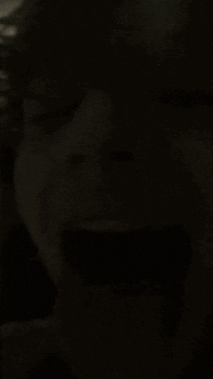 a close up of a person 's tongue sticking out