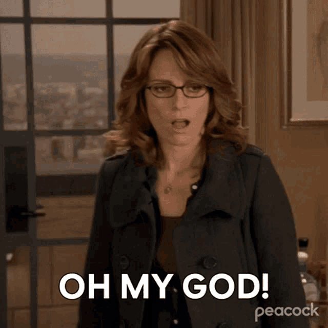 a woman with glasses and a black coat says oh my god