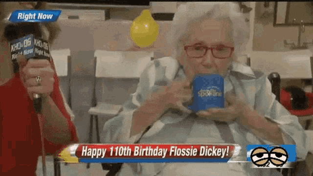 an elderly woman in a wheelchair drinking from a blue cup with the words happy 110th birthday flossie dickey