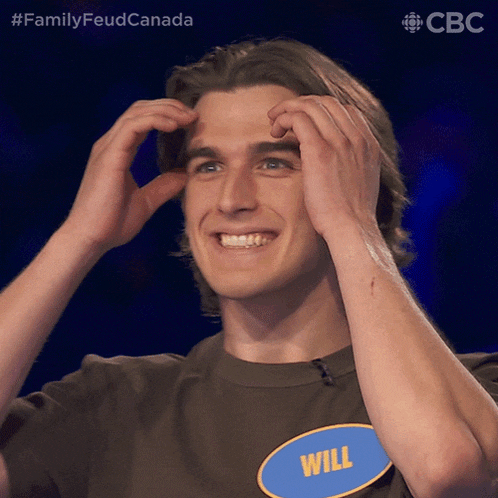 a man with a name tag that says will is smiling