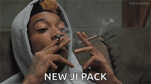 a man is smoking a cigarette and says new ji pack