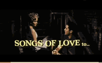 a man and a woman are sitting next to each other and the words tuesday weld are on the screen