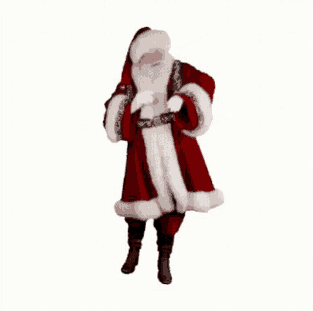 santa claus is dancing with his hands on his hips .