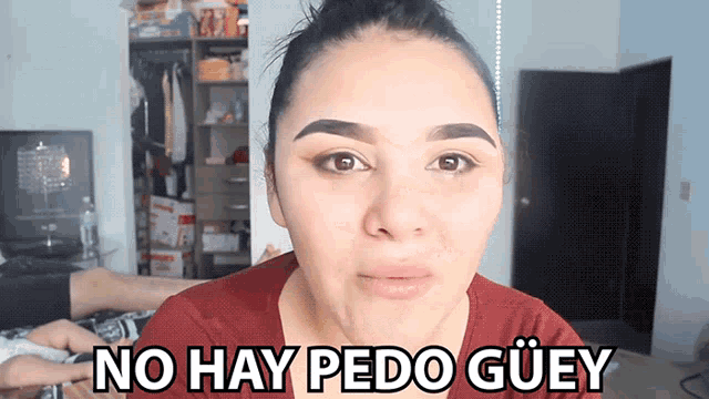 a woman says " no hay pedo guiey " in spanish