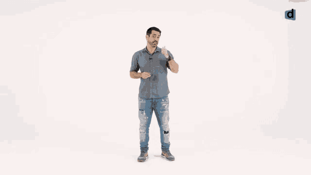 a man stands in front of a white background with the word brasil on it
