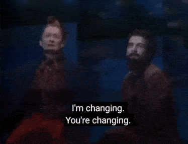 a man and a woman are standing next to each other and the man says it keeps fading