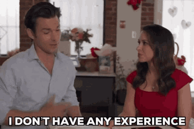 a man and a woman are sitting at a table and the woman says i don t have any experience