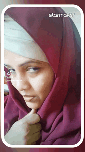 a tiktok video of a woman wearing a hijab is displayed on a starmaker app