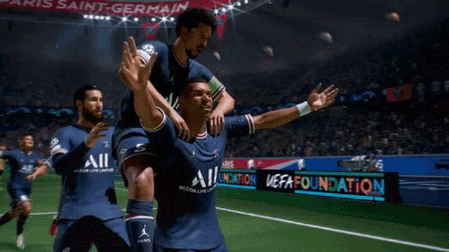a group of soccer players are celebrating a goal in front of a banner that says paris saint-germain