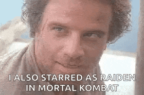 a close up of a man 's face with the words `` i also starred as raiden in mortal kombat '' written on it